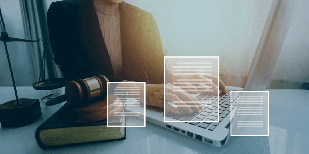Person at a laptop with a judge's gavel and a law book on the desk; several floating document symbols digitally overlaid.