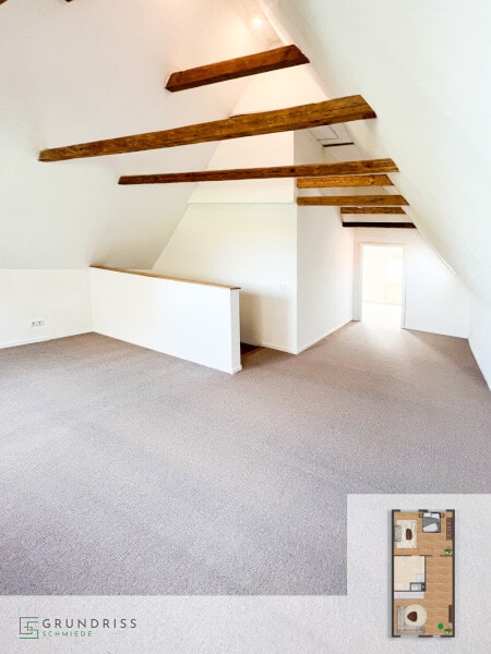 Converted loft space with exposed timber beams and an open door to another room in the background, with an upper-floor plan in the lower right corner highlighting the living area.