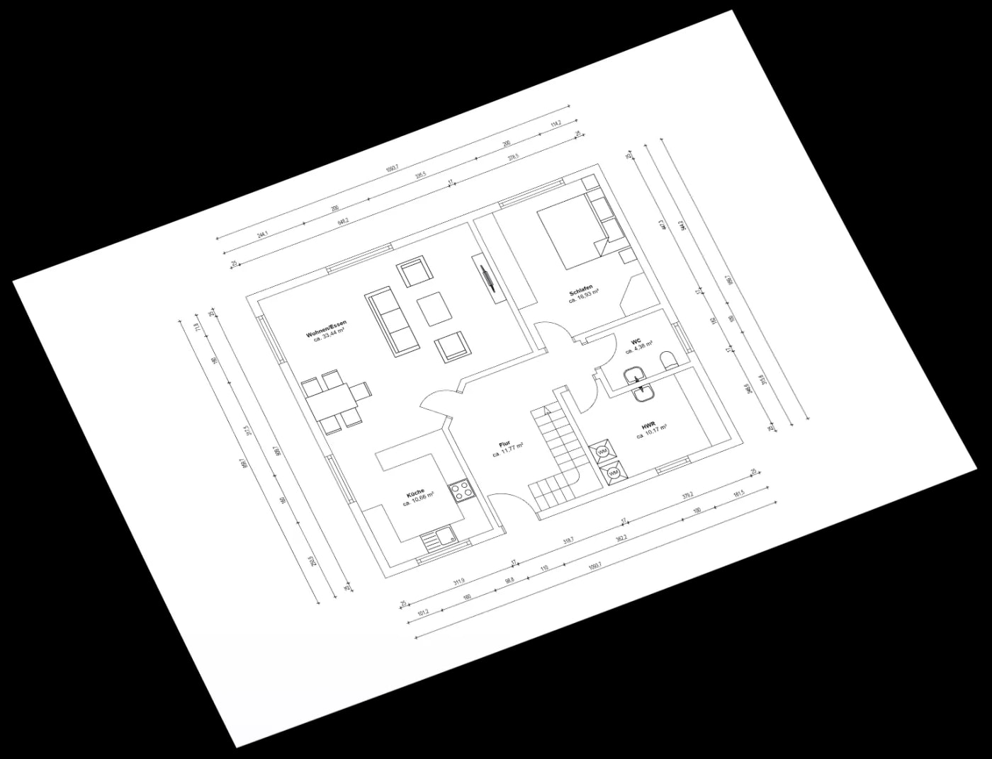 Dimensioned floor plan of the ground floor of a building with living and dining area, open kitchen and a utility room.
