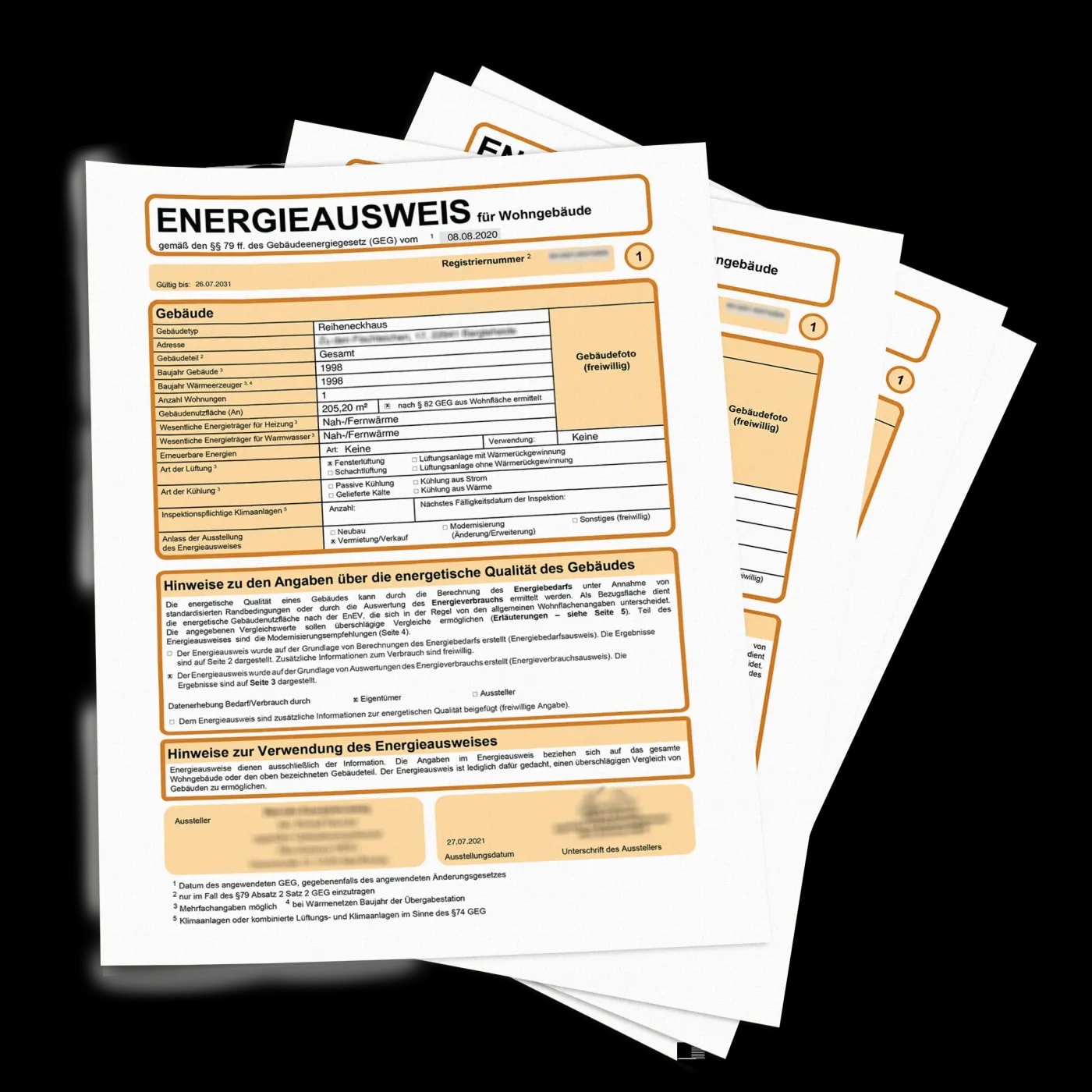 A stack of sample energy performance certificates in paper form — in light orange with pixelated details.