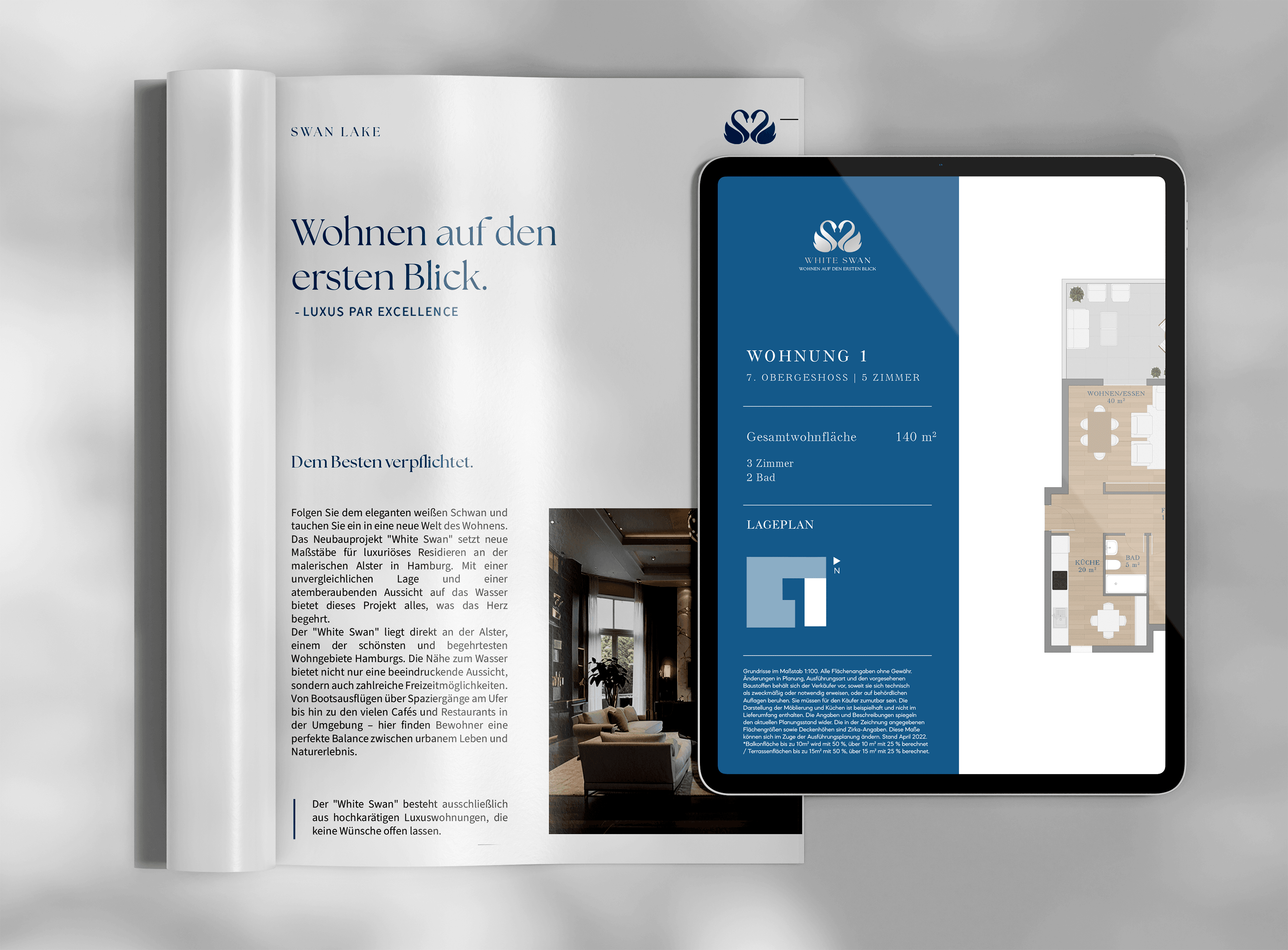 Tablet mit Factsheet zum 'Swan Lake' Projekt liegt auf einem broschierten, aufgeschlagenen Exposé zum Projekt.