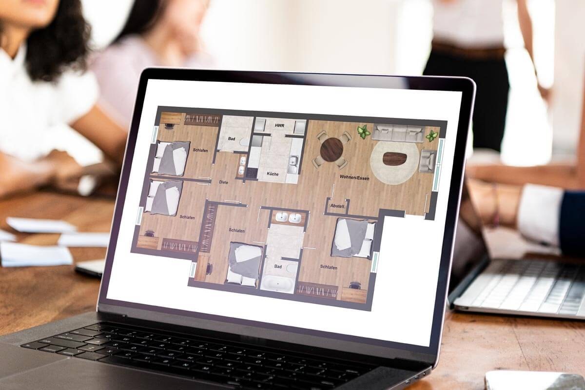 Tablet showing a modern, realistic floor plan on a desk, with a meeting taking place in the background