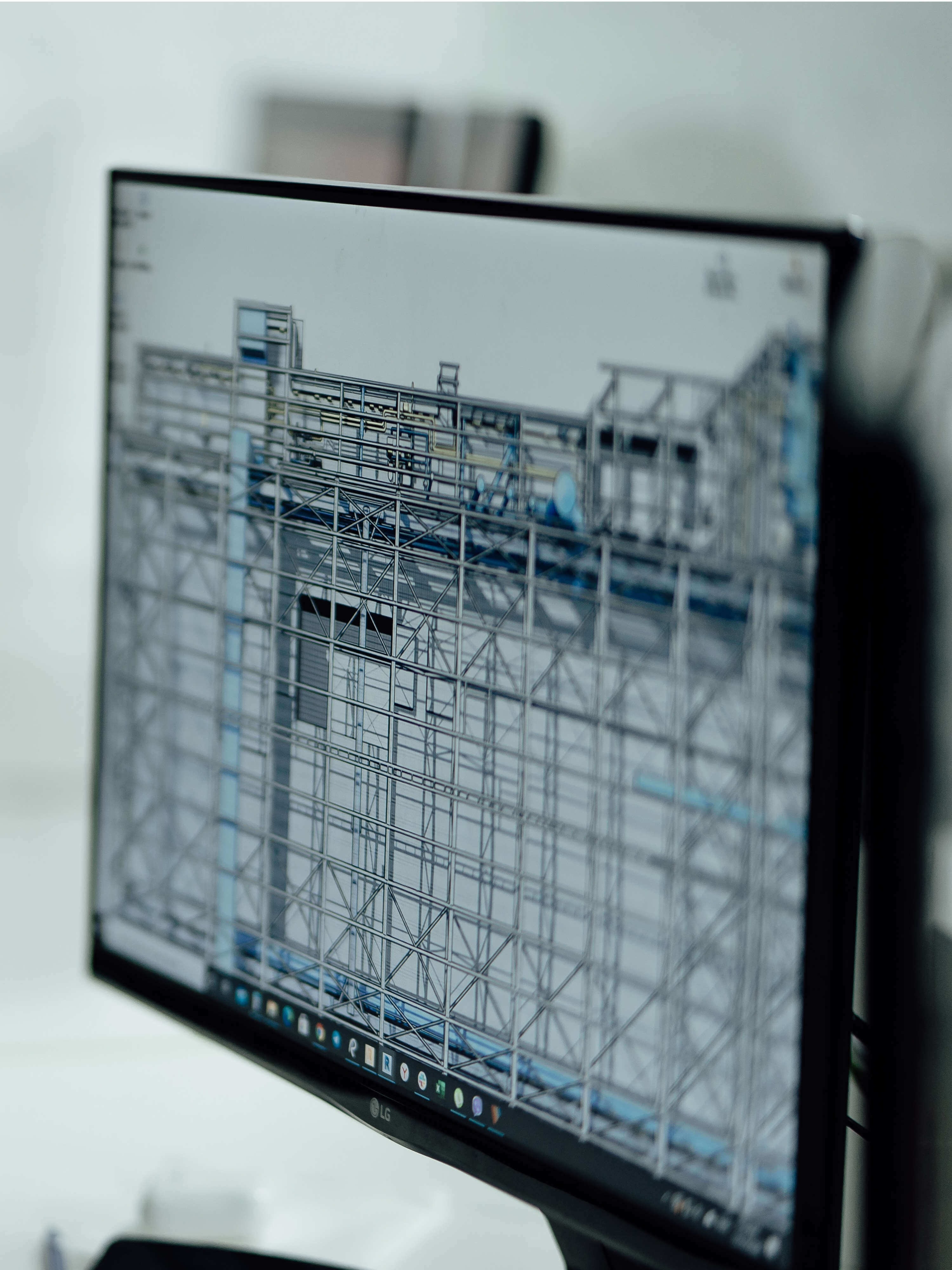 Close-up of a detailed construction plan of an industrial hall on a monitor.